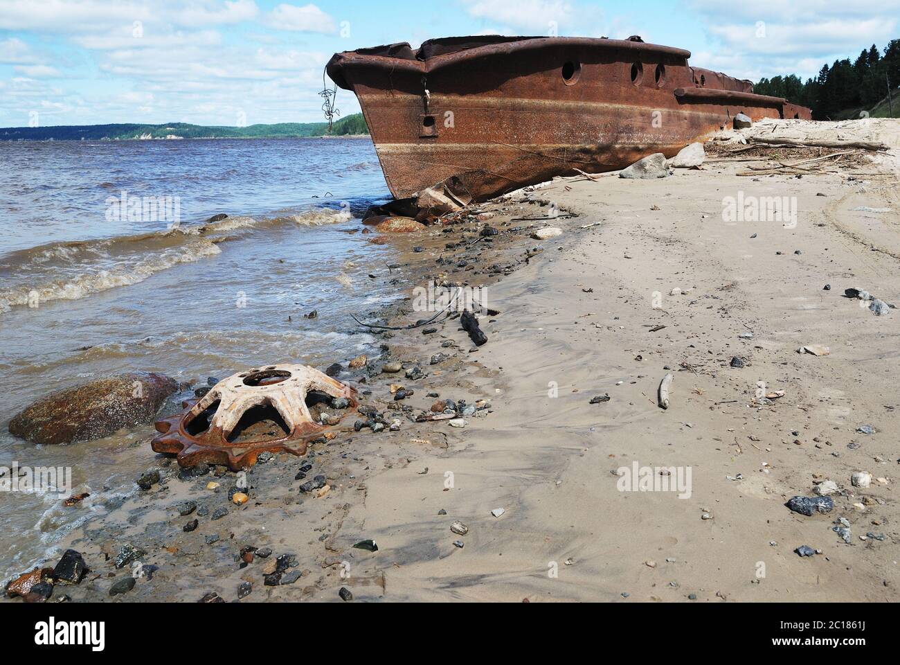 rusty ship on the shore of  Ob river in Russia Stock Photo