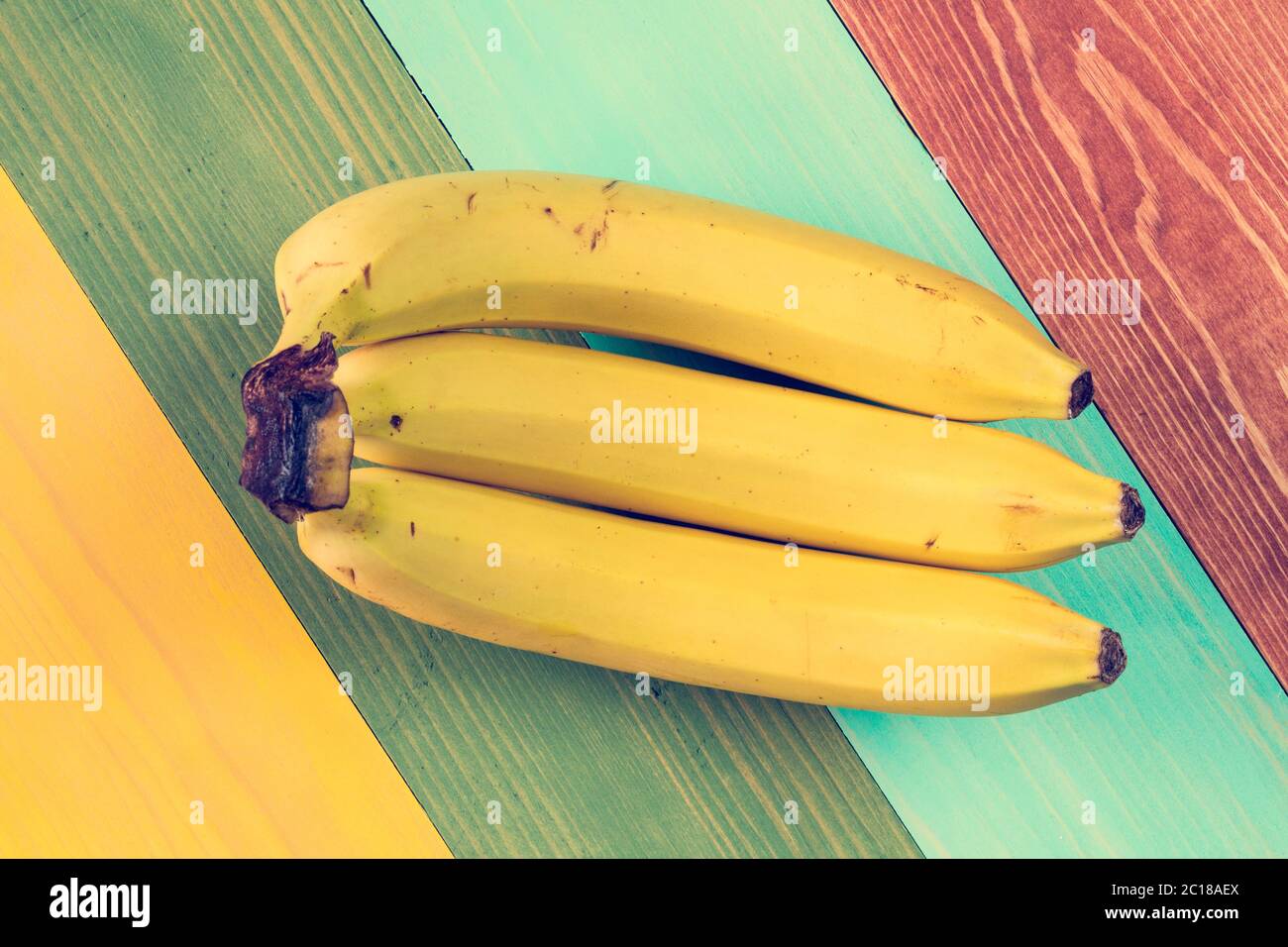 Three ripe banana fruits Stock Photo - Alamy