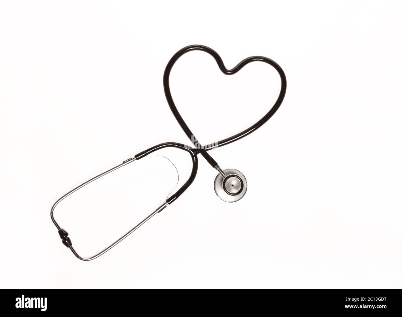 Stethoscope in shape of heart isolated on white background Stock Photo