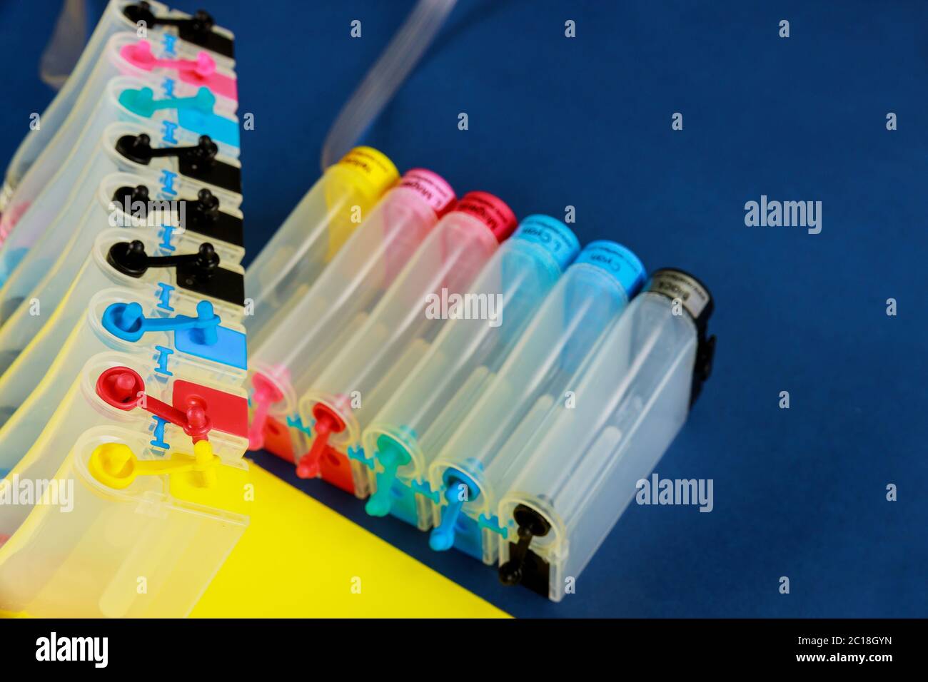 Refilling ink tank external color tanks with inkjet printer Stock Photo