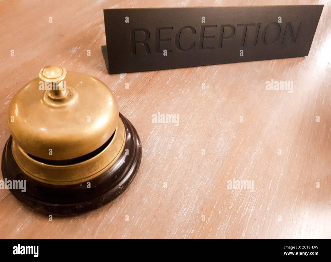 Bell at reception desk Stock Photo - Alamy