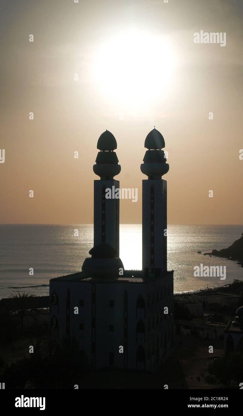 Contre-jour view to Mosque of the Divinity at sunset, Dakar, Senegal Stock Photo