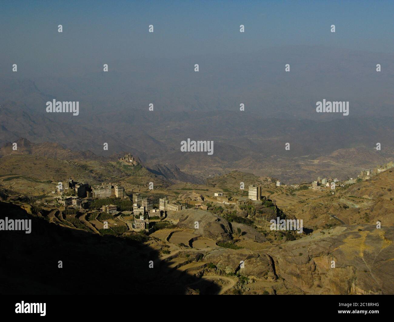 View to Manakha fortress and old city and terrace farming, Yemen Stock Photo