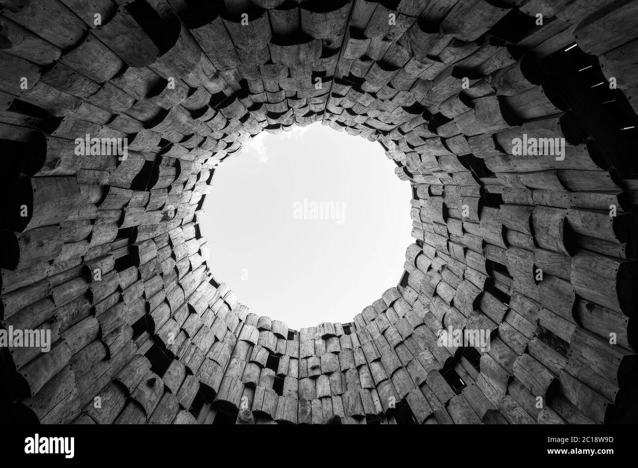 The sky is in a circle, the blue sky is in a tube of tiles. Russia, the Kaluga region, Nikola-Lenivets. Stock Photo