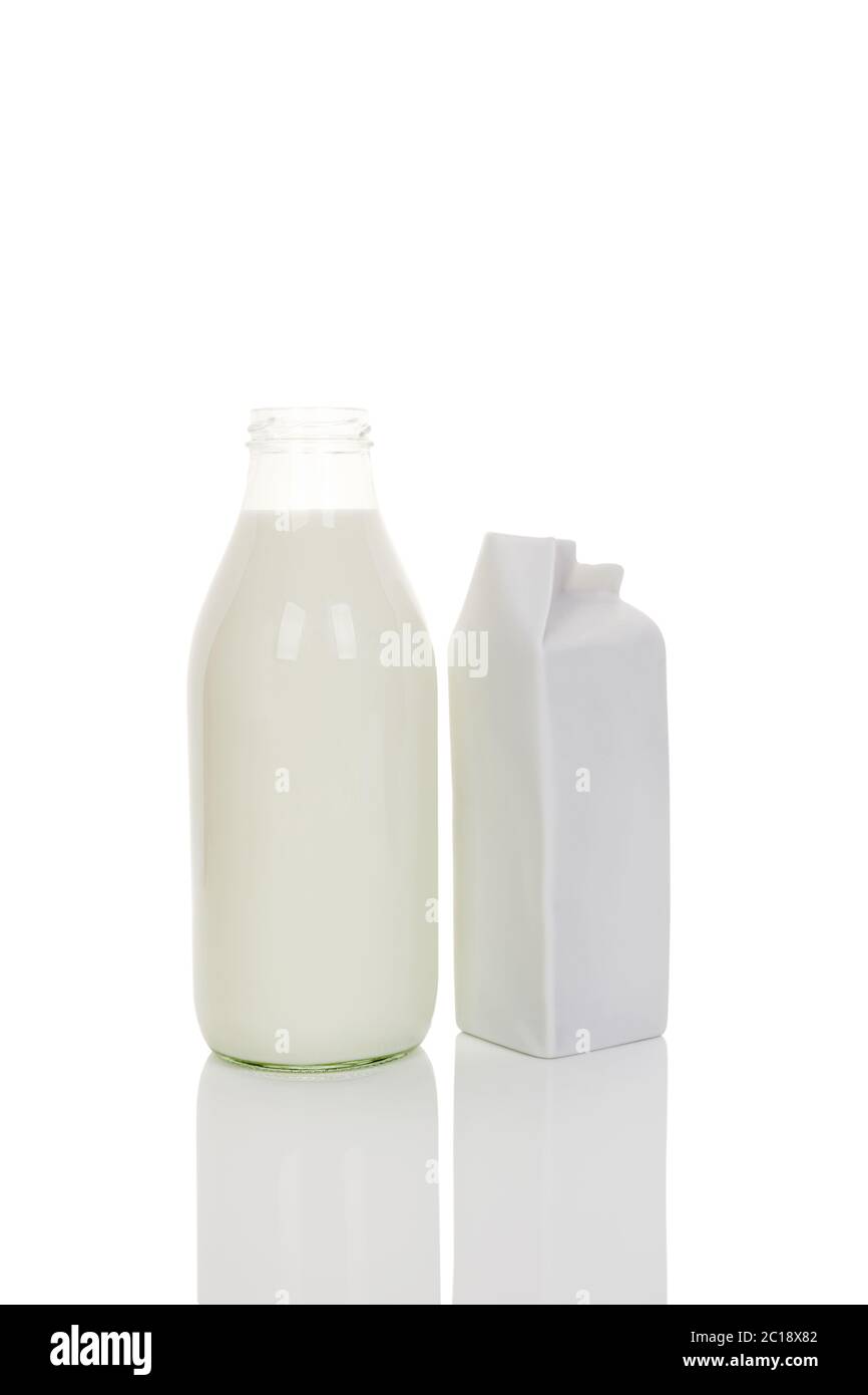 Bio milk in glass and carton bottle Stock Photo