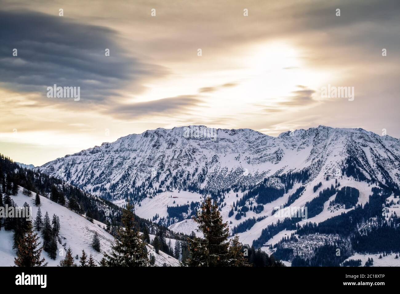 sunrise over alpine peaks Stock Photo