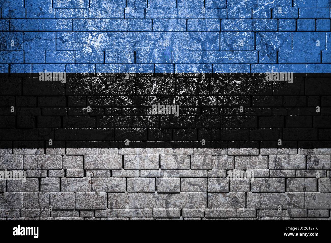 National flag of Estonia on brick wall background.The concept of ...