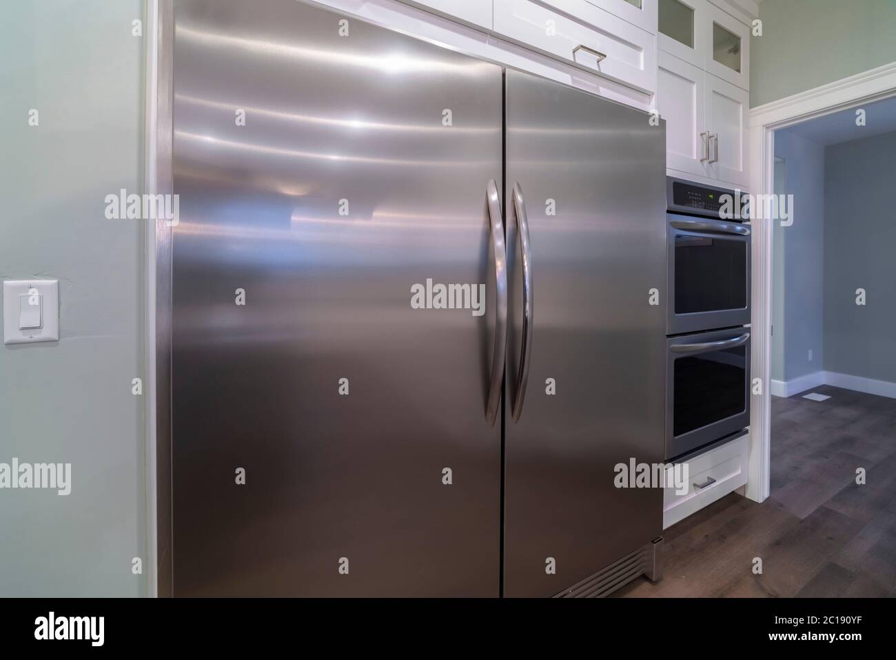 Large double door American fridge in a kitchen Stock Photo Alamy