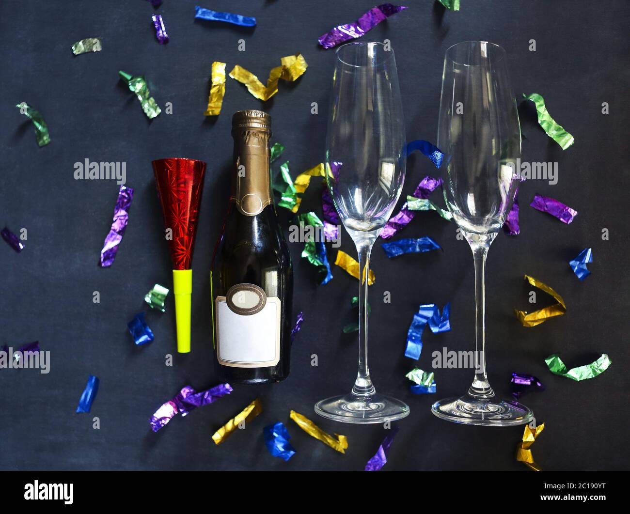 Champagne bottle and glasses on black background Stock Photo Alamy