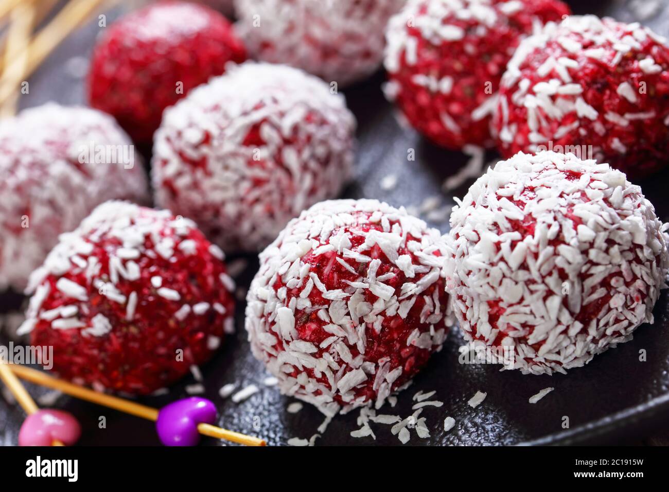 Australian summer low-calorie dessert: bliss of desiccated mixed with peanut butter and blueberries, blackberries, on Stock Photo - Alamy