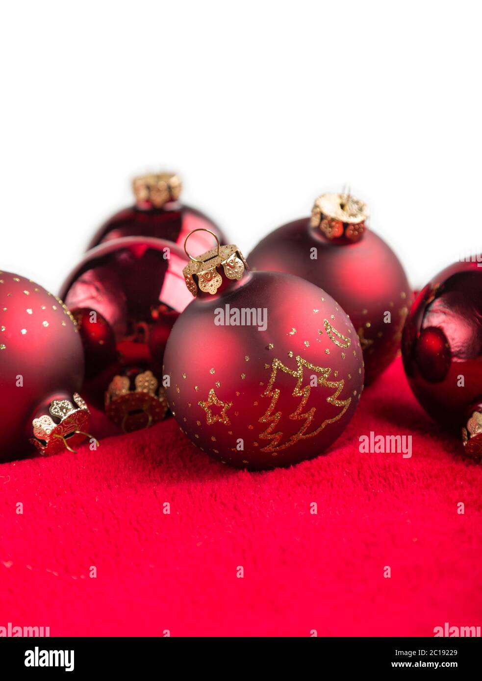 Red christmas ball on red background Stock Photo