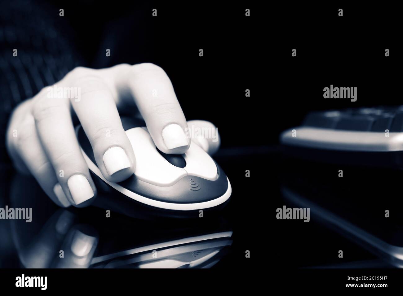 Female hand using computer mouse Stock Photo - Alamy