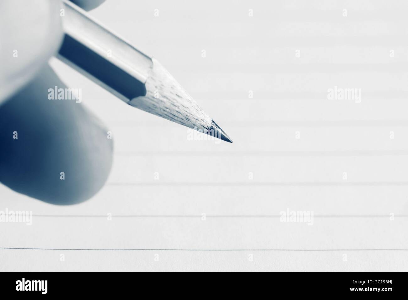 Male hand writing in notebook Stock Photo