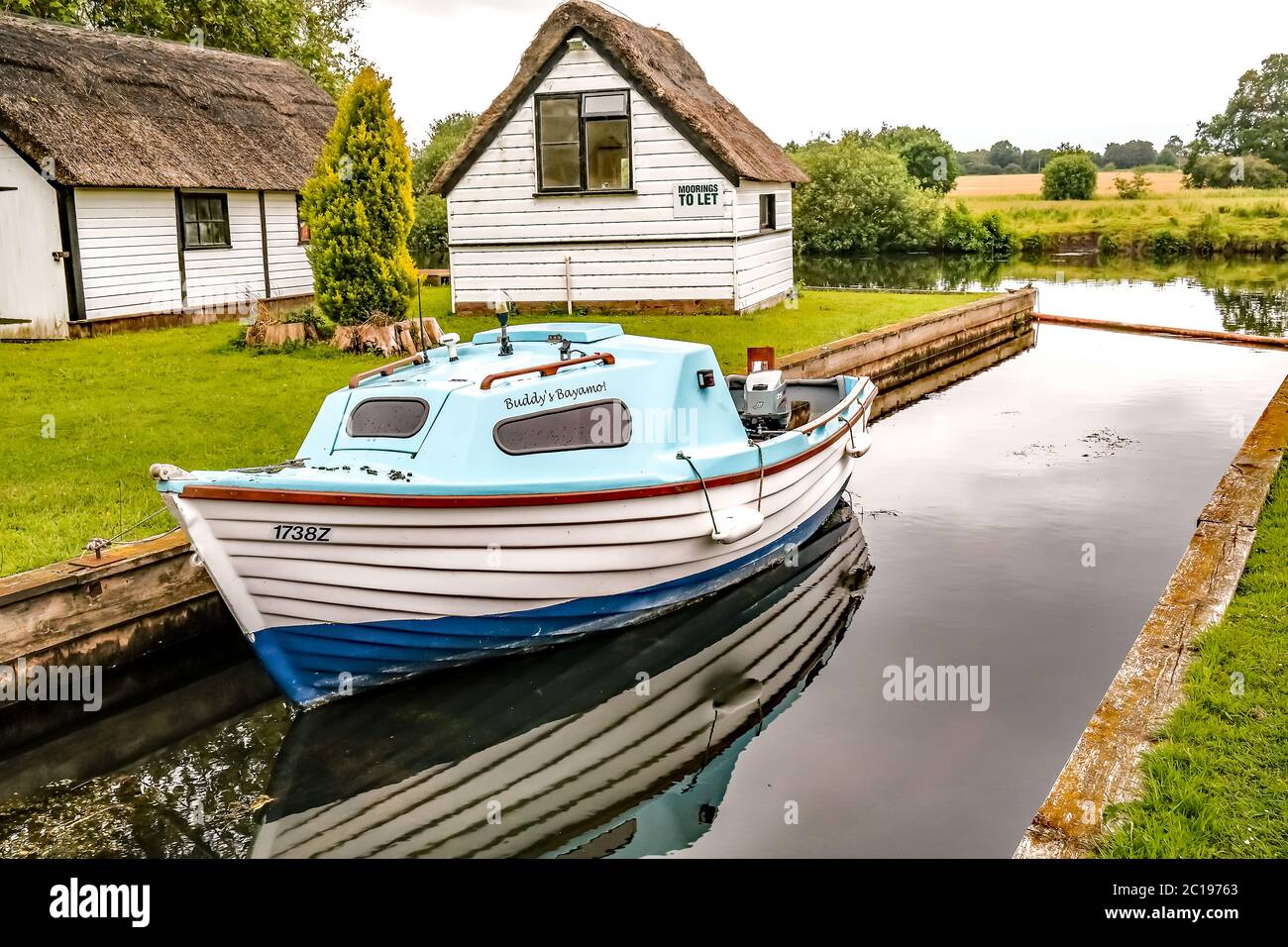 9 Private mooring, dyke and boat house on the River Bure in the village