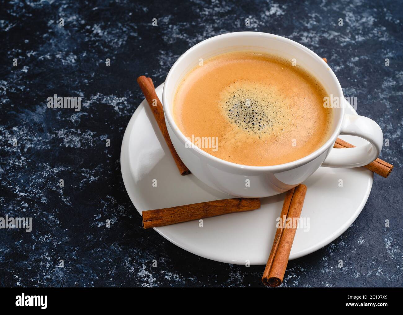 Vintage latte coffee with cinnamon Stock Photo Alamy