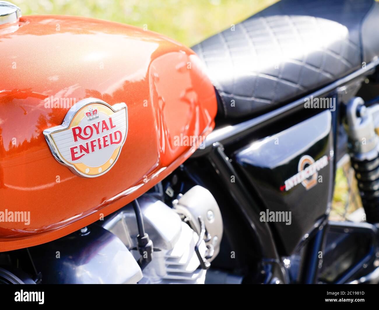 Bordeaux , Aquitaine / France - 06 01 2020 : Royal Enfield logo sign on tank motorcycle in orange color of vintage indian classic motorbike Stock Photo