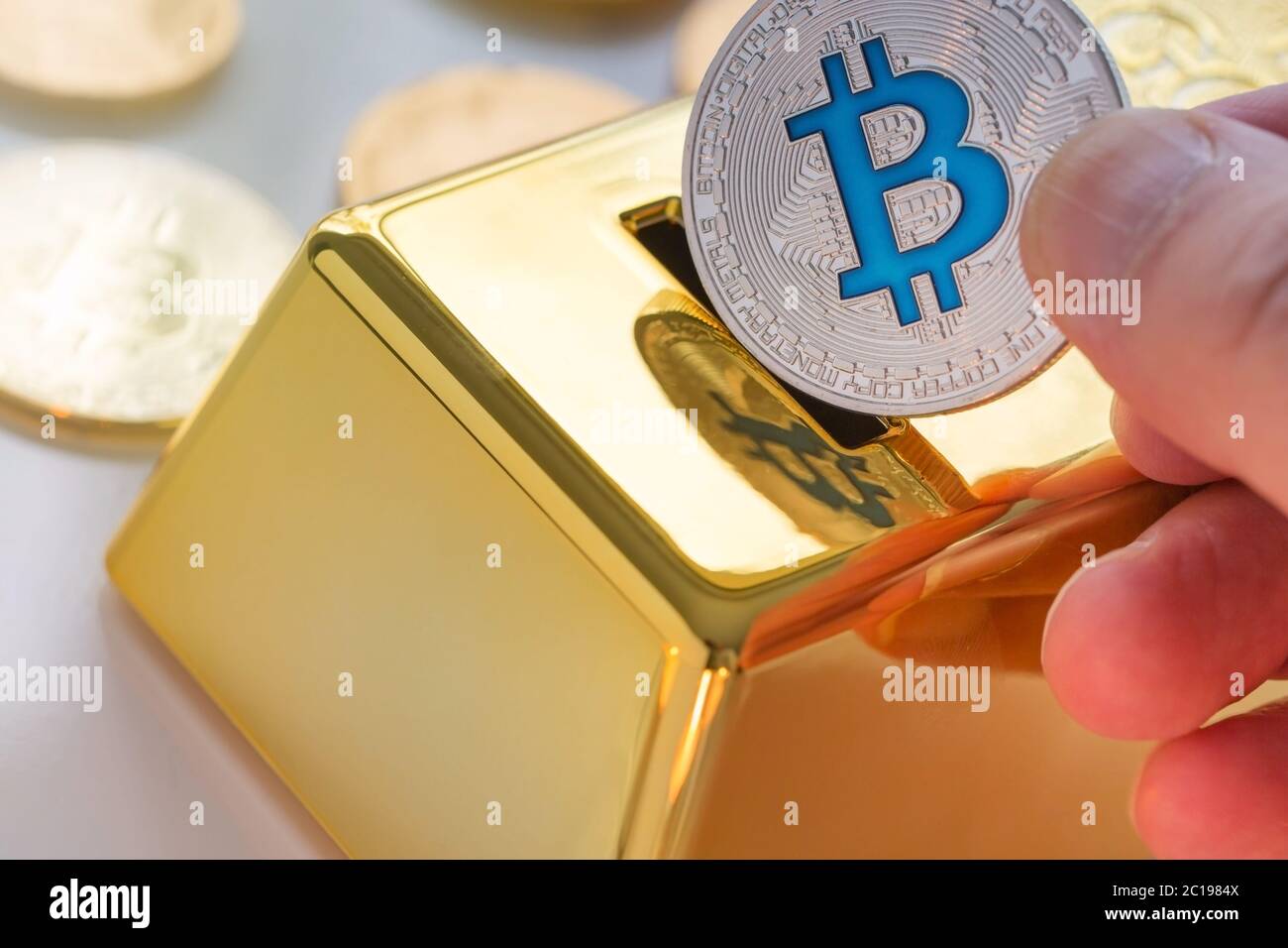 Concept of Cryptocurrency physical bitcoin with gold bullion piggy bank  Stock Photo - Alamy