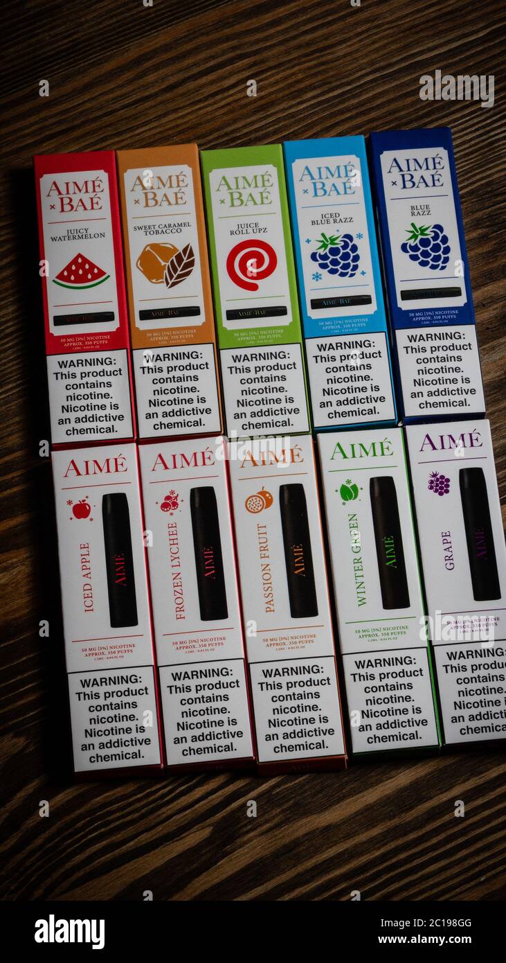 Ufa, Russia, Vape Shop, 3 July, 2019: E-liquid e-juice High vape for  electronic cigarette vaping device , on counter in smoke vapor in vape bar  in bot Stock Photo - Alamy