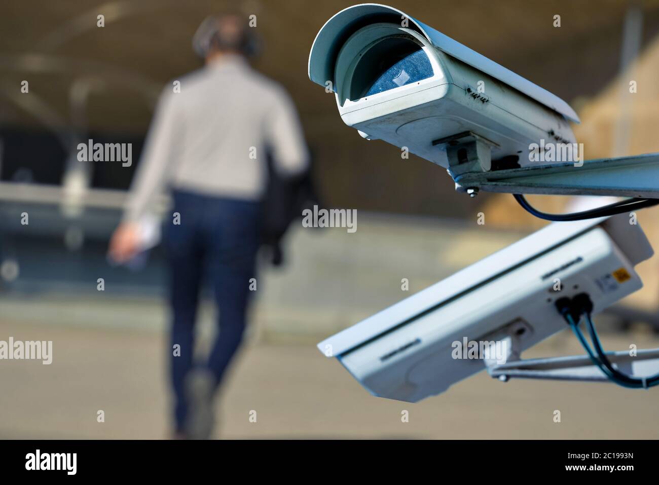 security CCTV camera or surveillance system with man on blurry