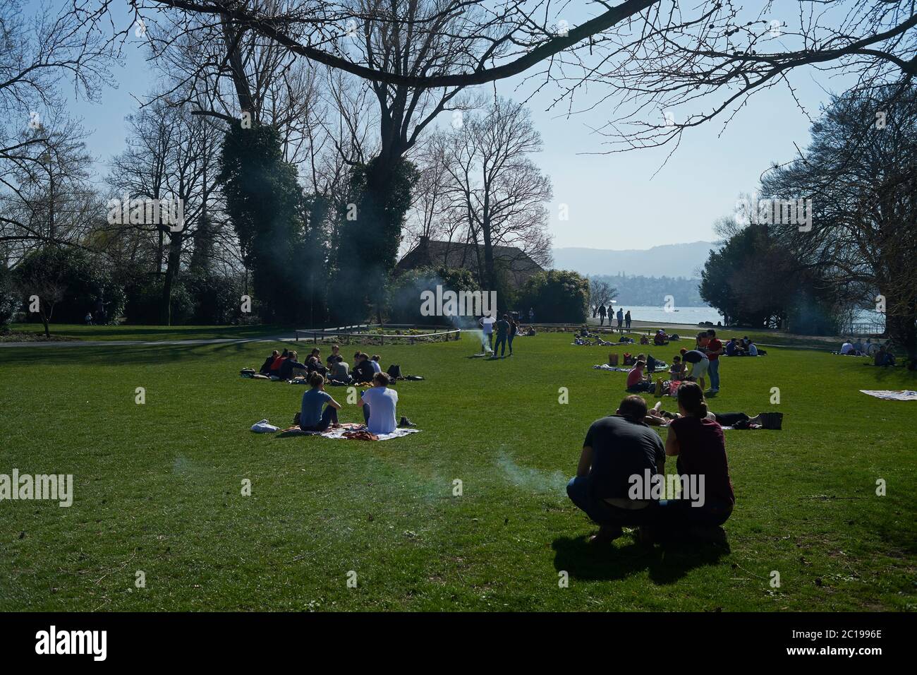 People enjoying their time off over the weekend having a barbeque in a