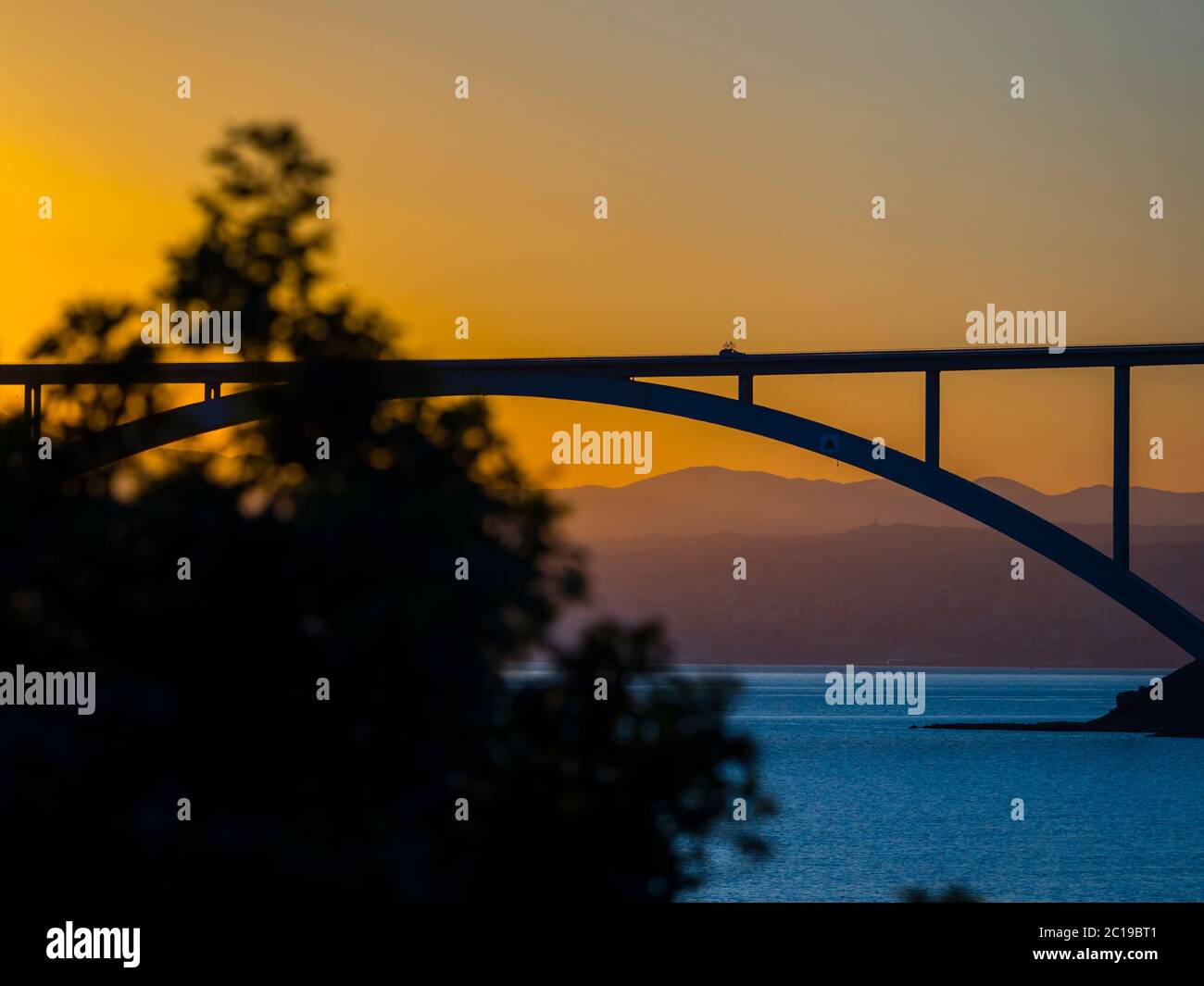Sunset dusk landscape bridge mainland to island Krk Croatia Stock Photo