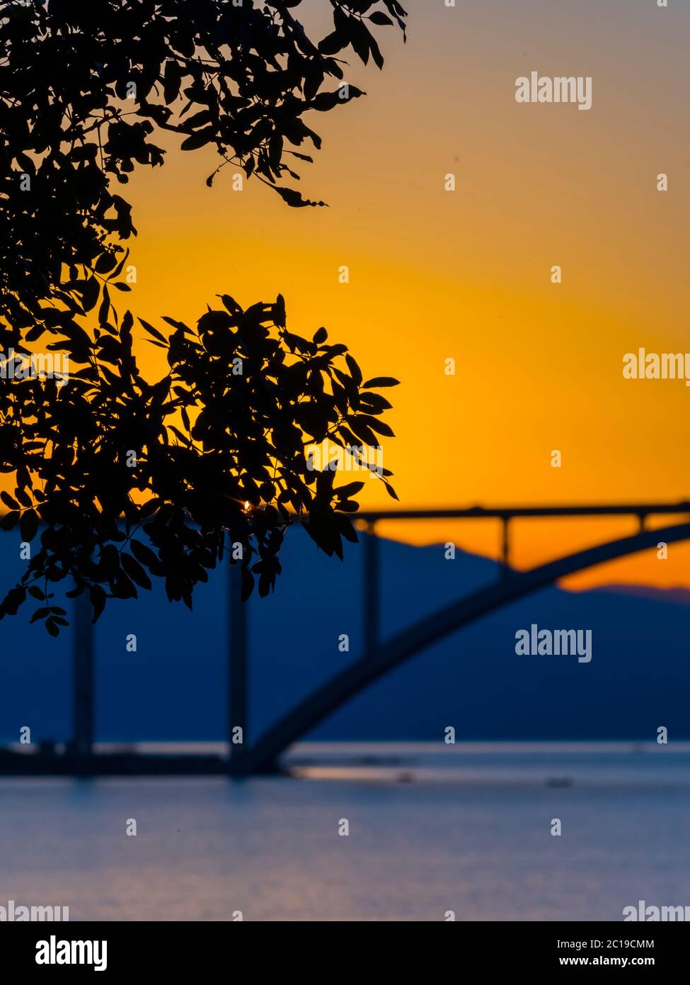 Sunset dusk landscape bridge mainland to island Krk Croatia Stock Photo