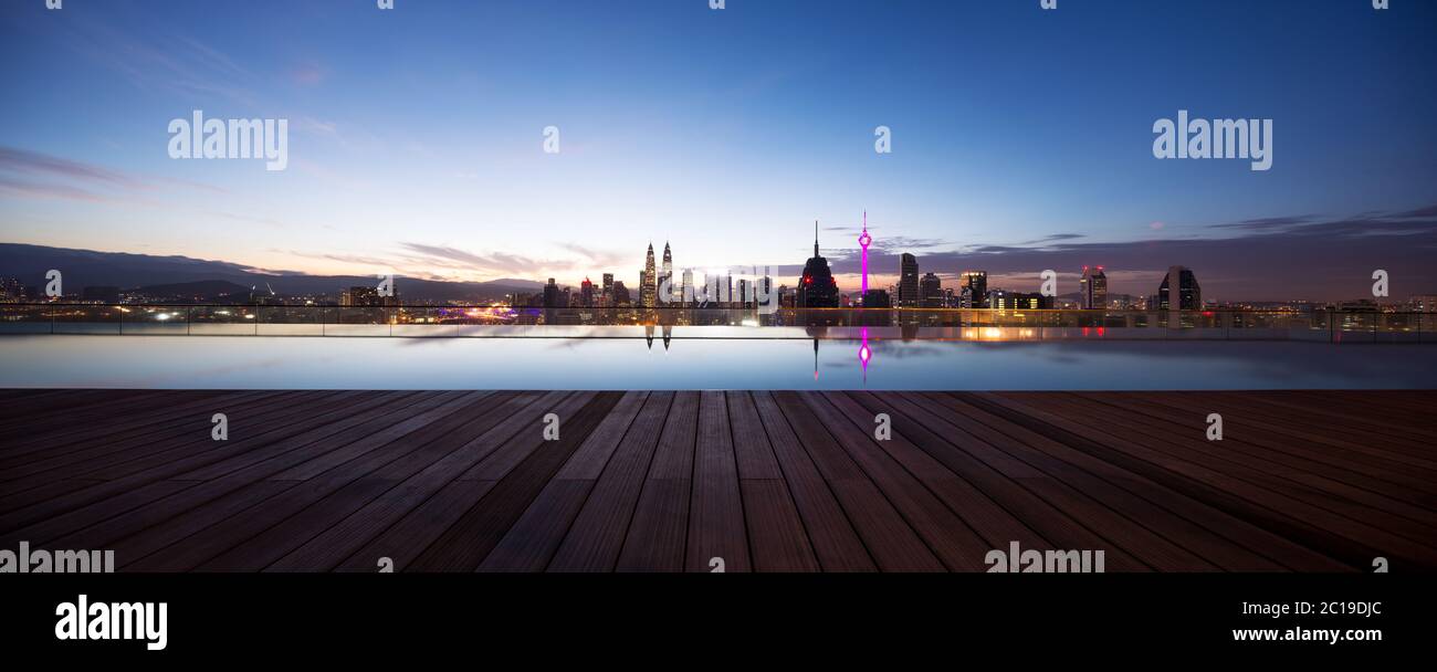 cityscape of modern city and tranquil pool Stock Photo