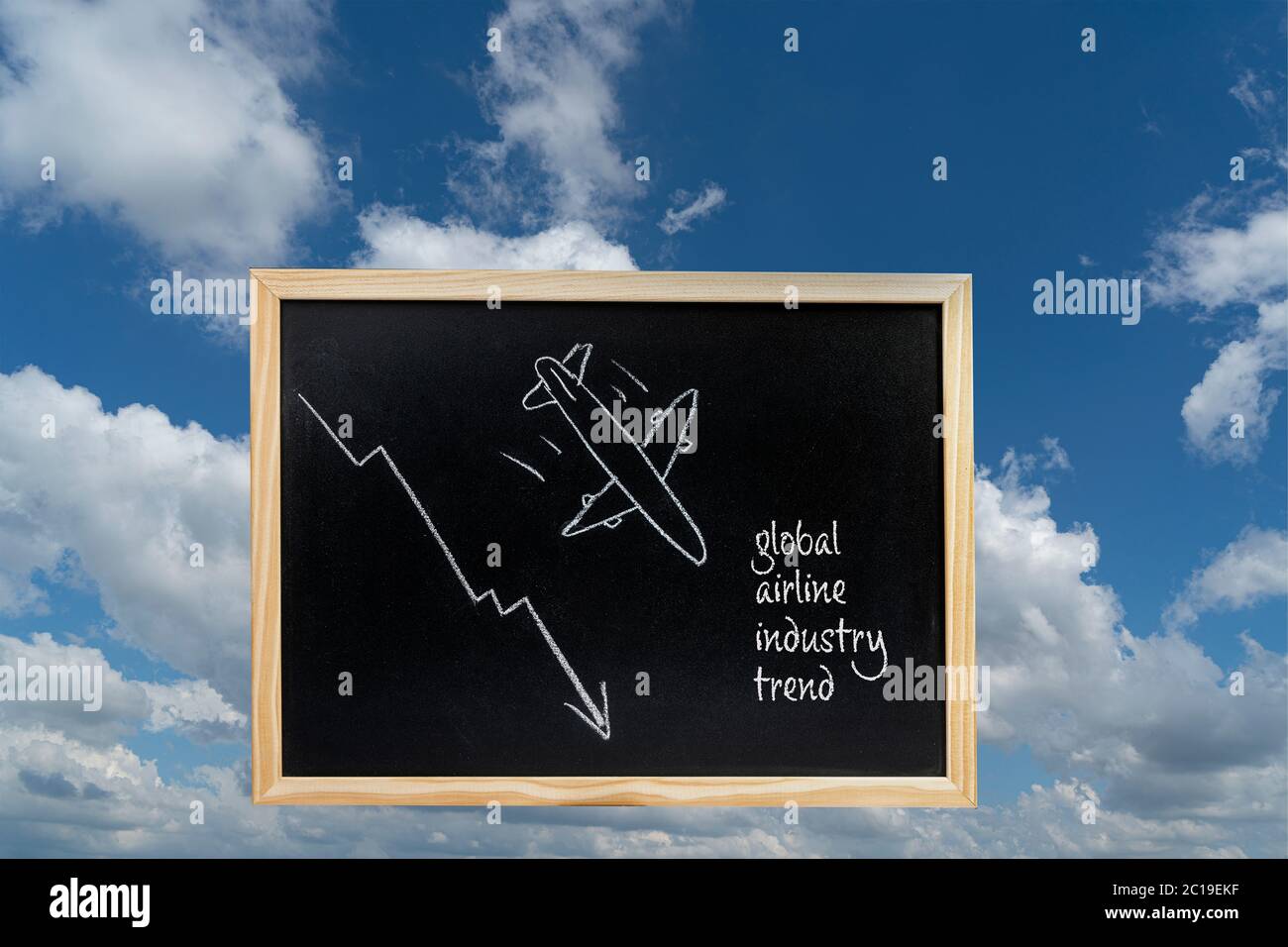 a blackboard with the Global Airline industry trend drawn Stock Photo