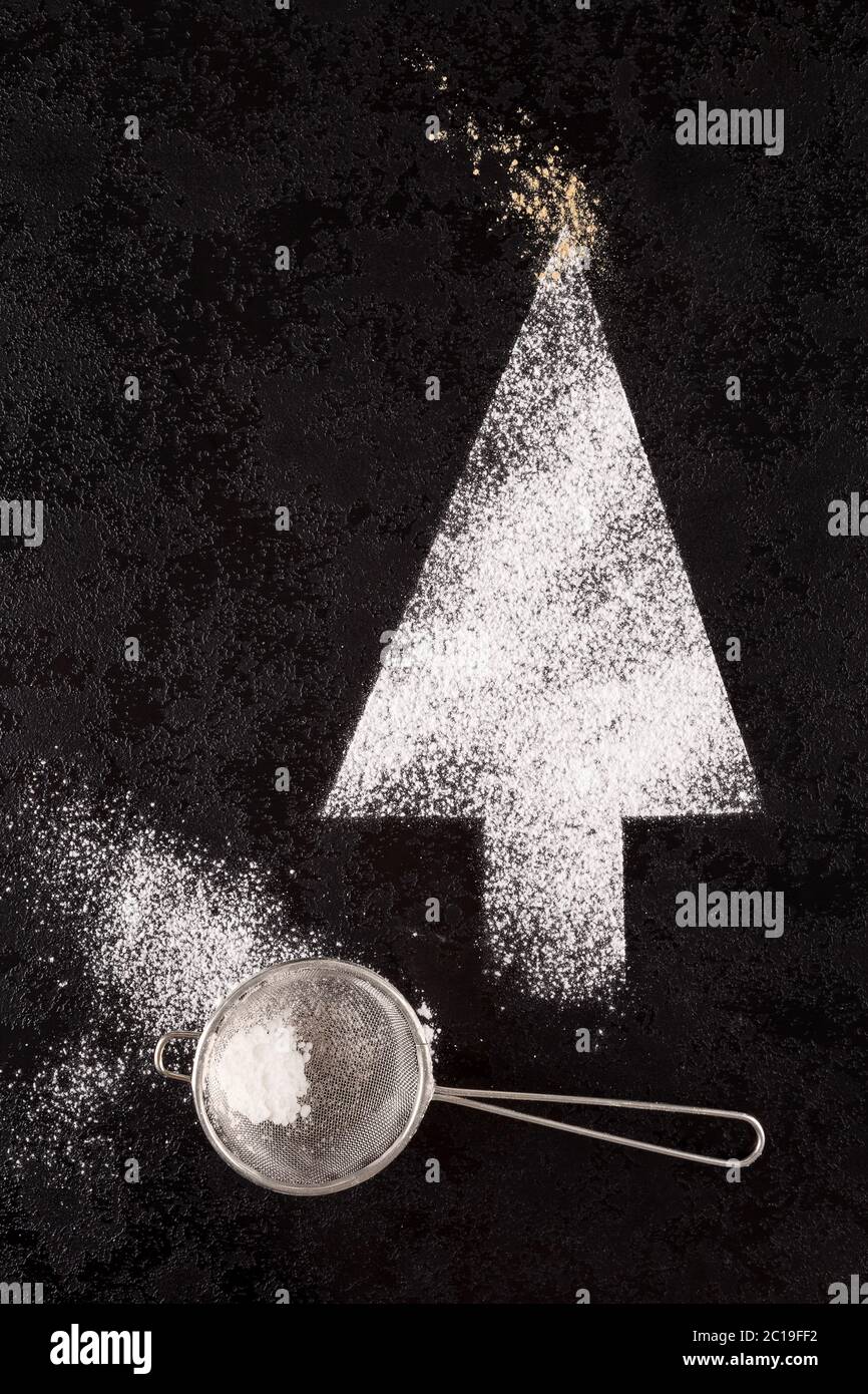 Sugar christmas tree with sifter Stock Photo Alamy
