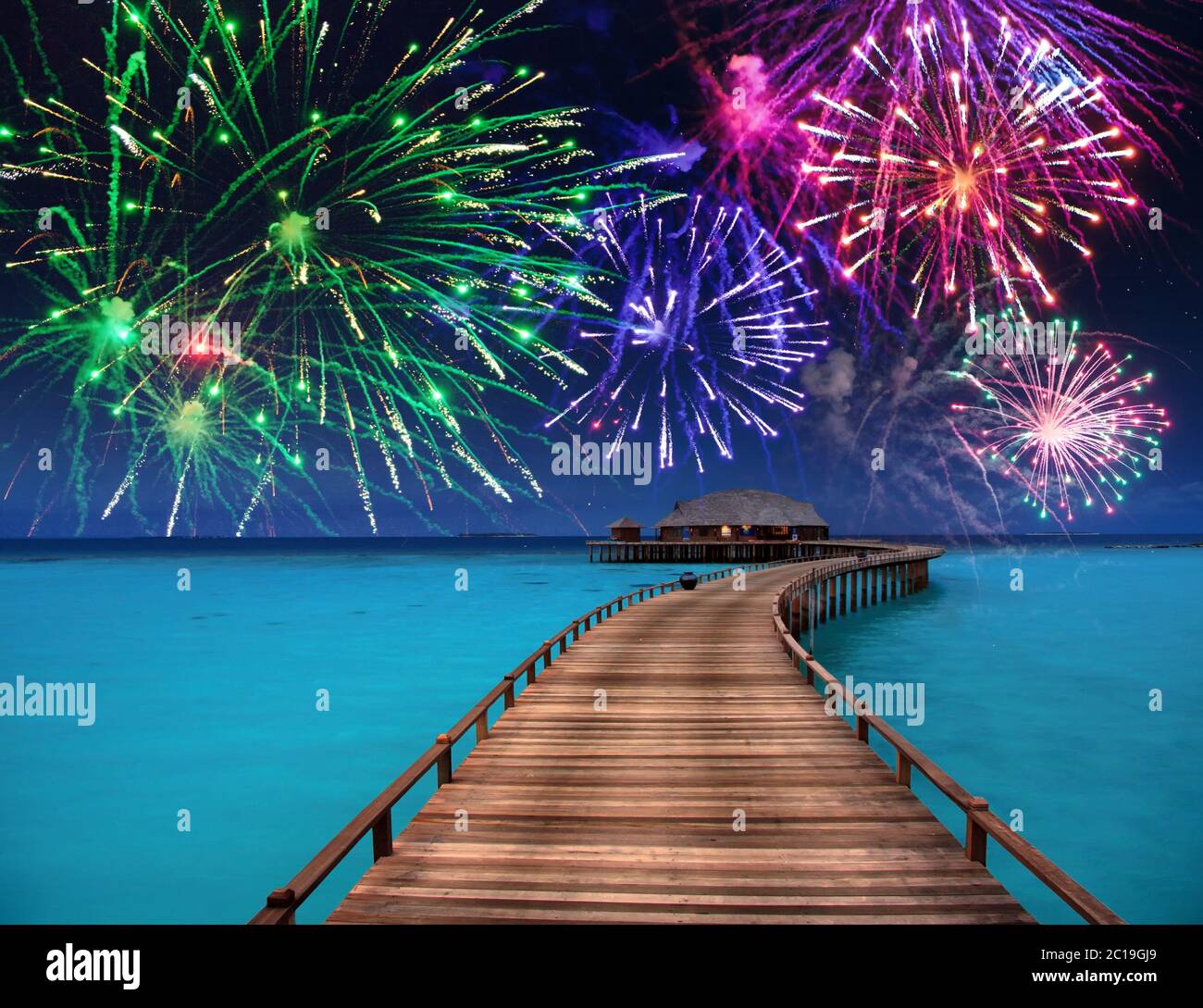 New Year's fireworks over the tropical island Stock Photo Alamy