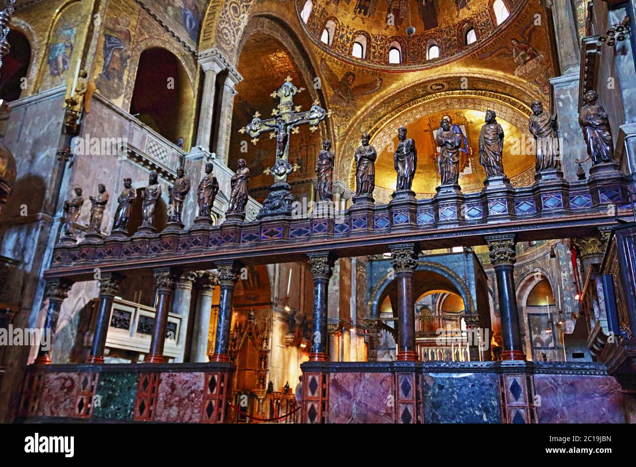 The interior with high altar and golden cupola mosaics of St Mark s Basilica,View to western apse. Venice Italy,June 7th 2016 Stock Photo