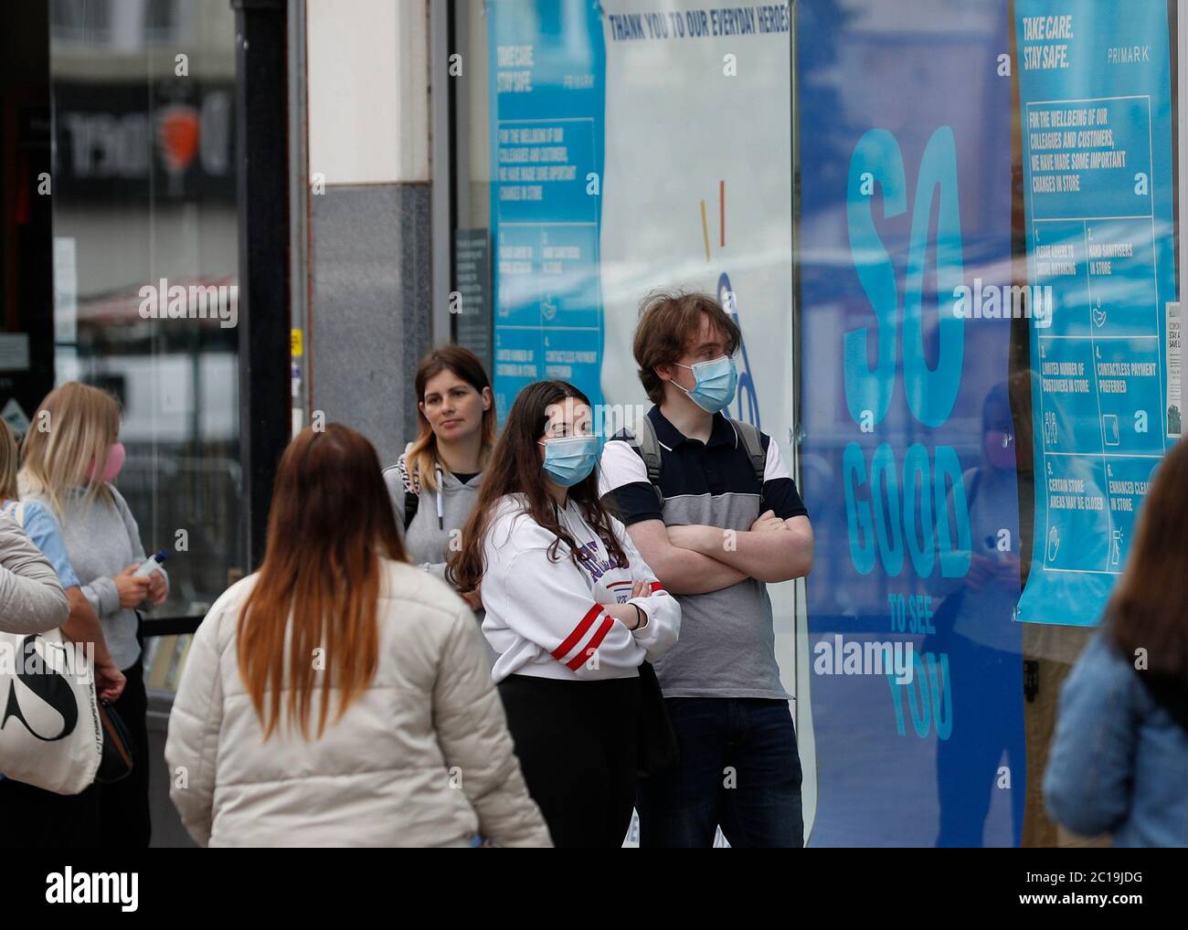 Loughborough, Leicestershire, UK. 15th June 2020. Customers queue to enter a Primark clothes store as non essential shops reopen in England after coronavirus pandemic lockdown restrictions were eased. Credit Darren Staples/Alamy Live News. Stock Photo