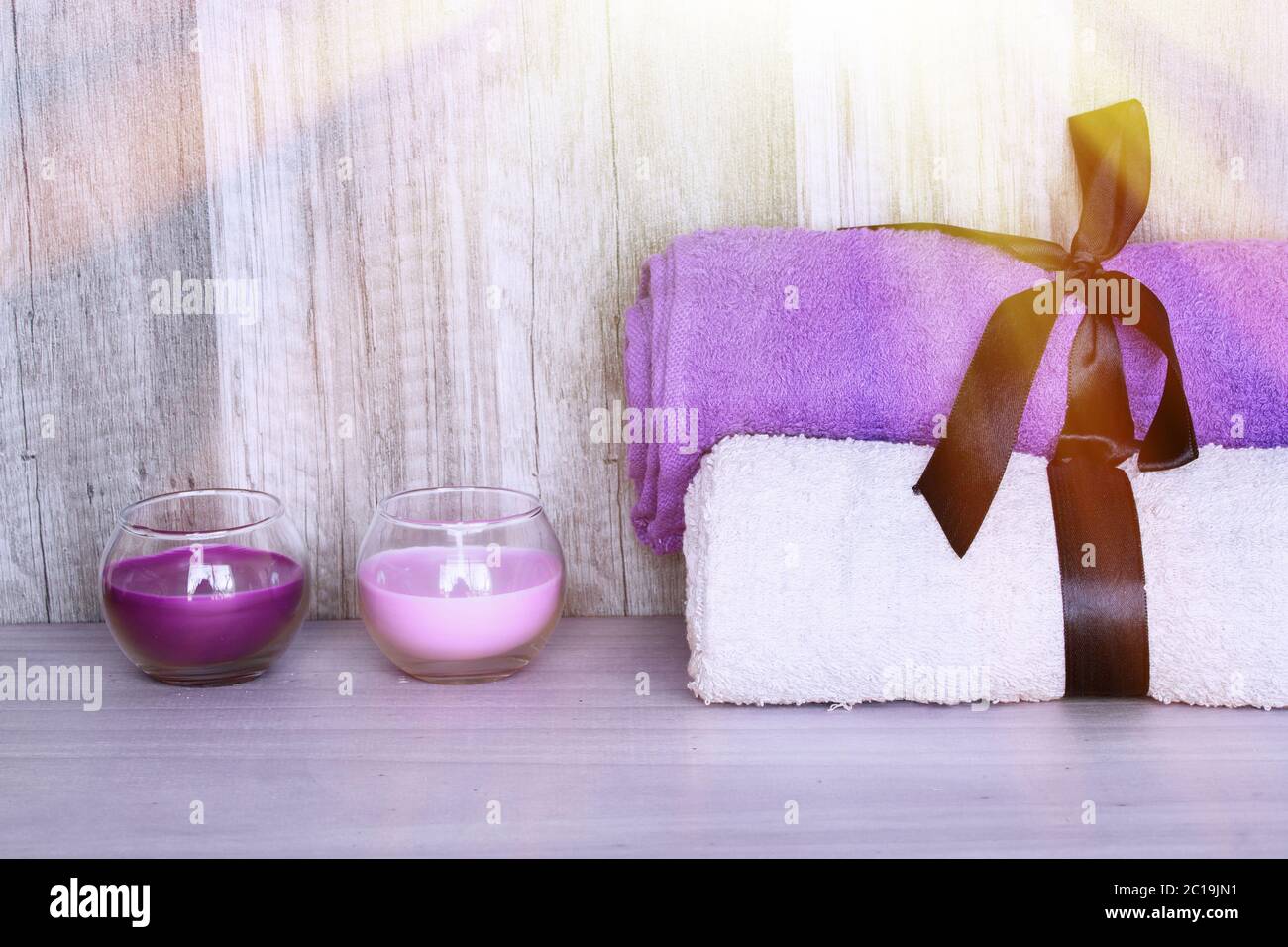 Towels with decorative candles. Beauty Spa Health and Wellness concept. Stock Photo