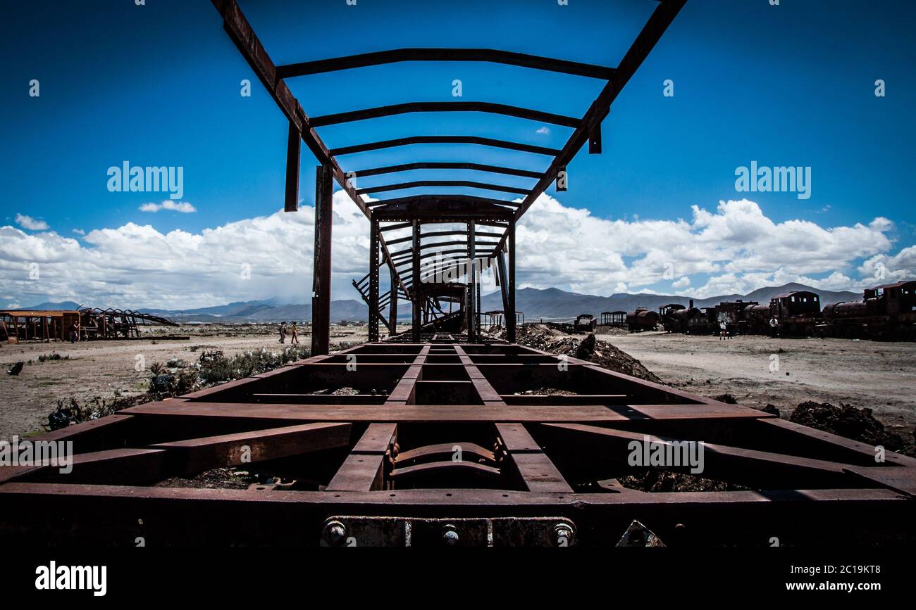 Uyuni's train cemitery in the Bolivian desert Stock Photo