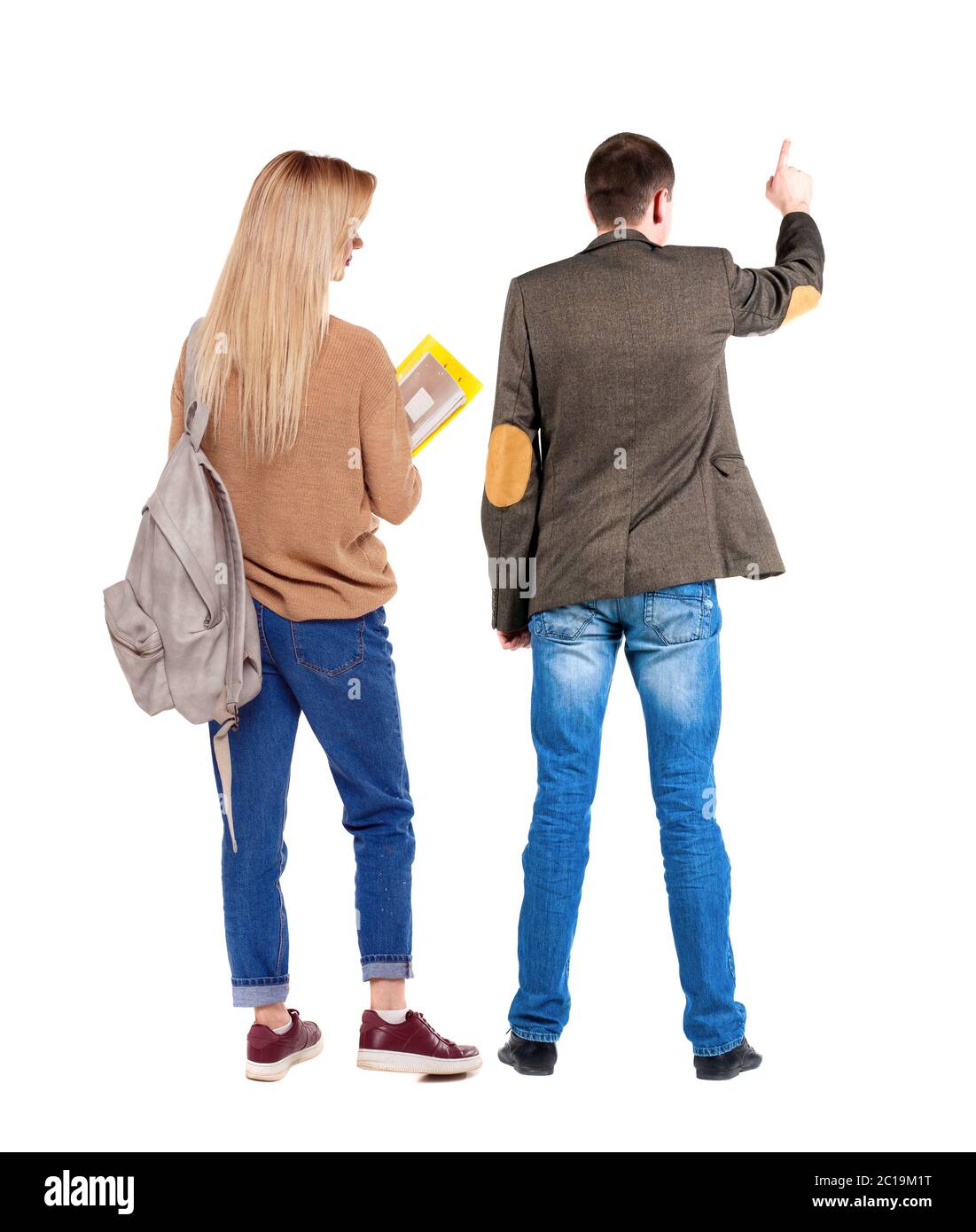 Back view of couple in sweater pointing. Rear view people collection ...