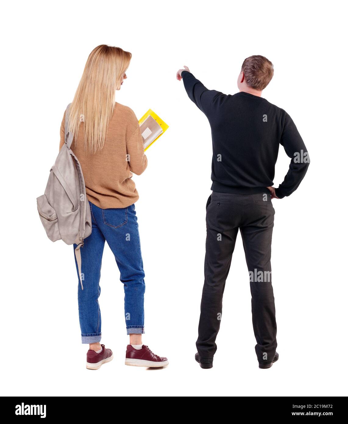 Back view of couple in sweater pointing. Rear view people collection ...