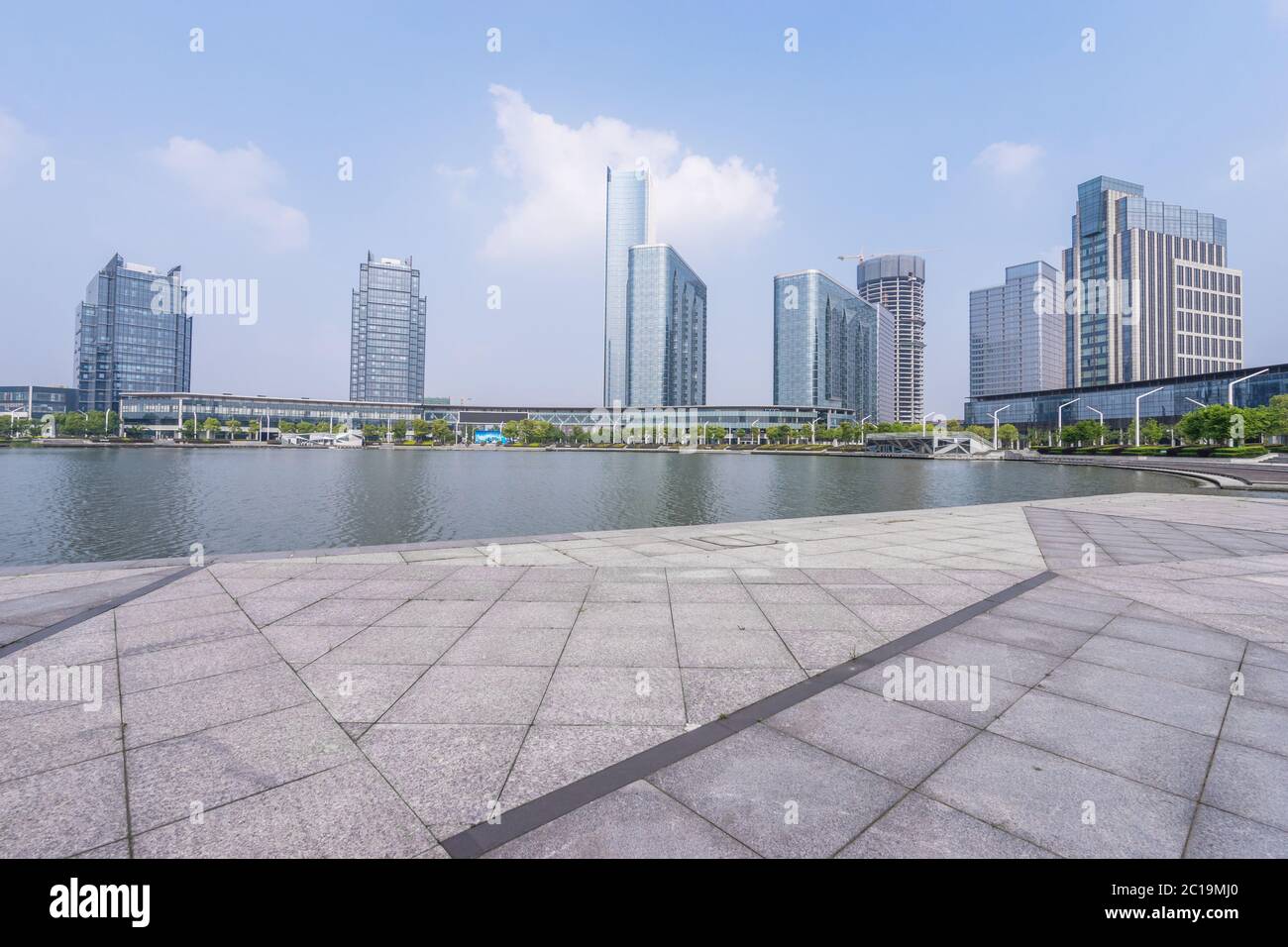 modern buildings near water in modern city Stock Photo