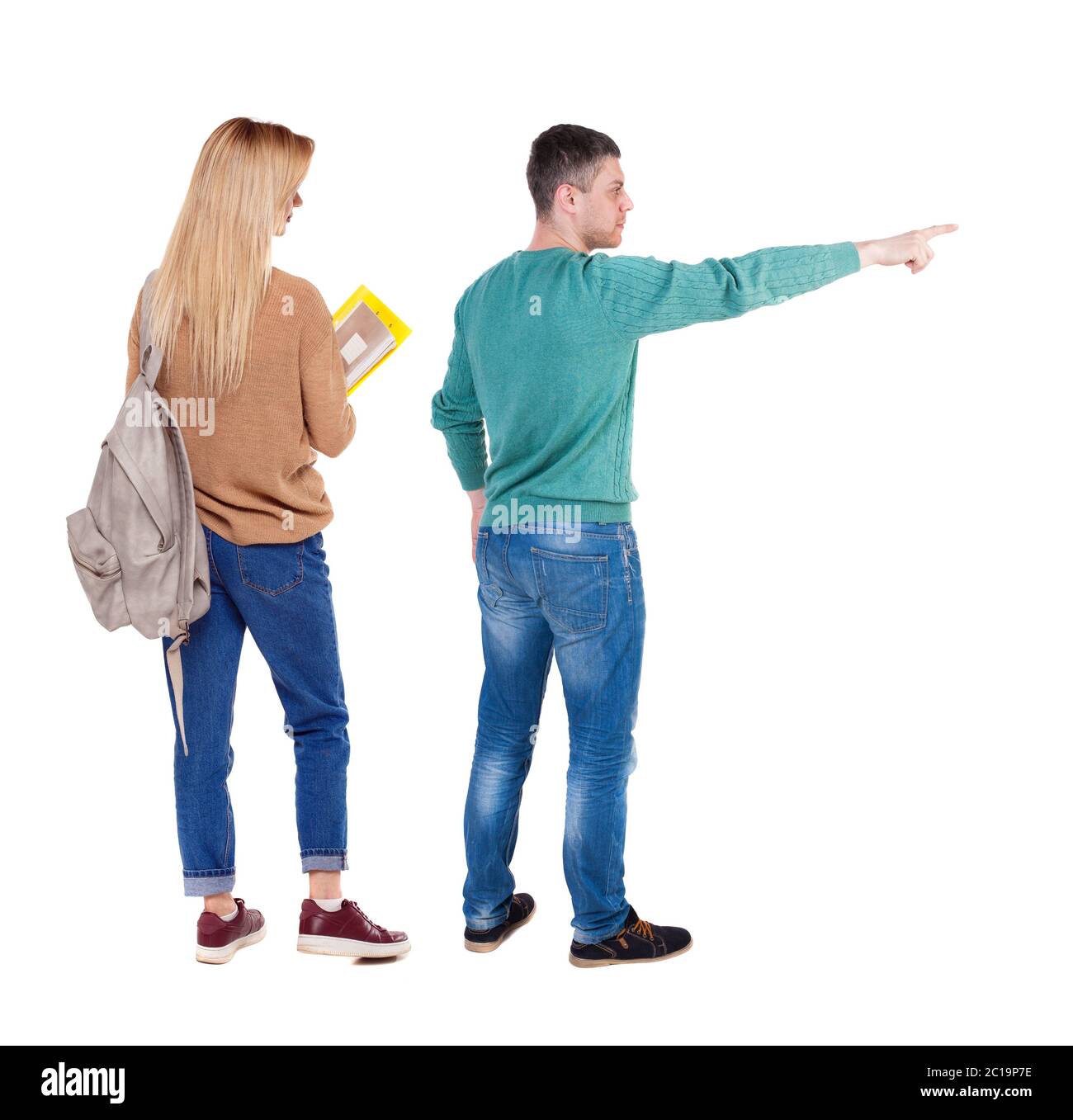 Back view of couple in sweater pointing. Rear view people collection ...