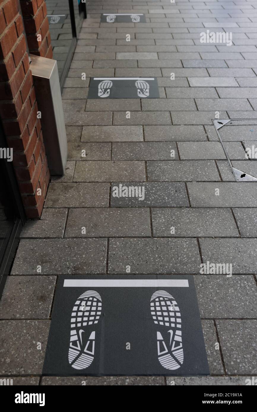 Wembley Park, London, UK. 15th June 2020. Nike Store in the London Designer  Outlet prepares for the safety of customers with socially distanced 2 metre  markings. Coronavirus Covid-19 lockdown restrictions allow non