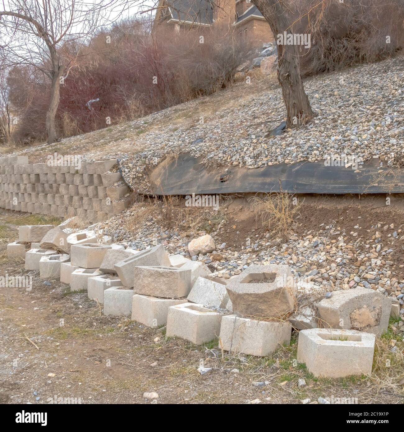 Stone Block Cropped Square crop Neighborhood scenery with view of collapsed retaining wall ...