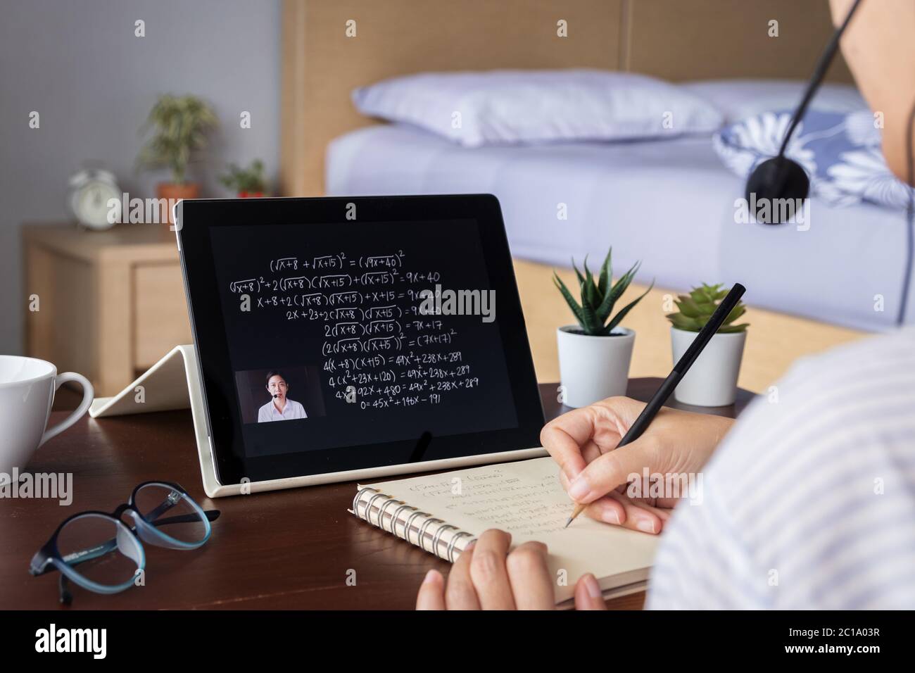 Asian teacher live streaming online lesson for student to make lecture via digital tablet at home. E-learning, homeschooling, remote distance Stock Photo