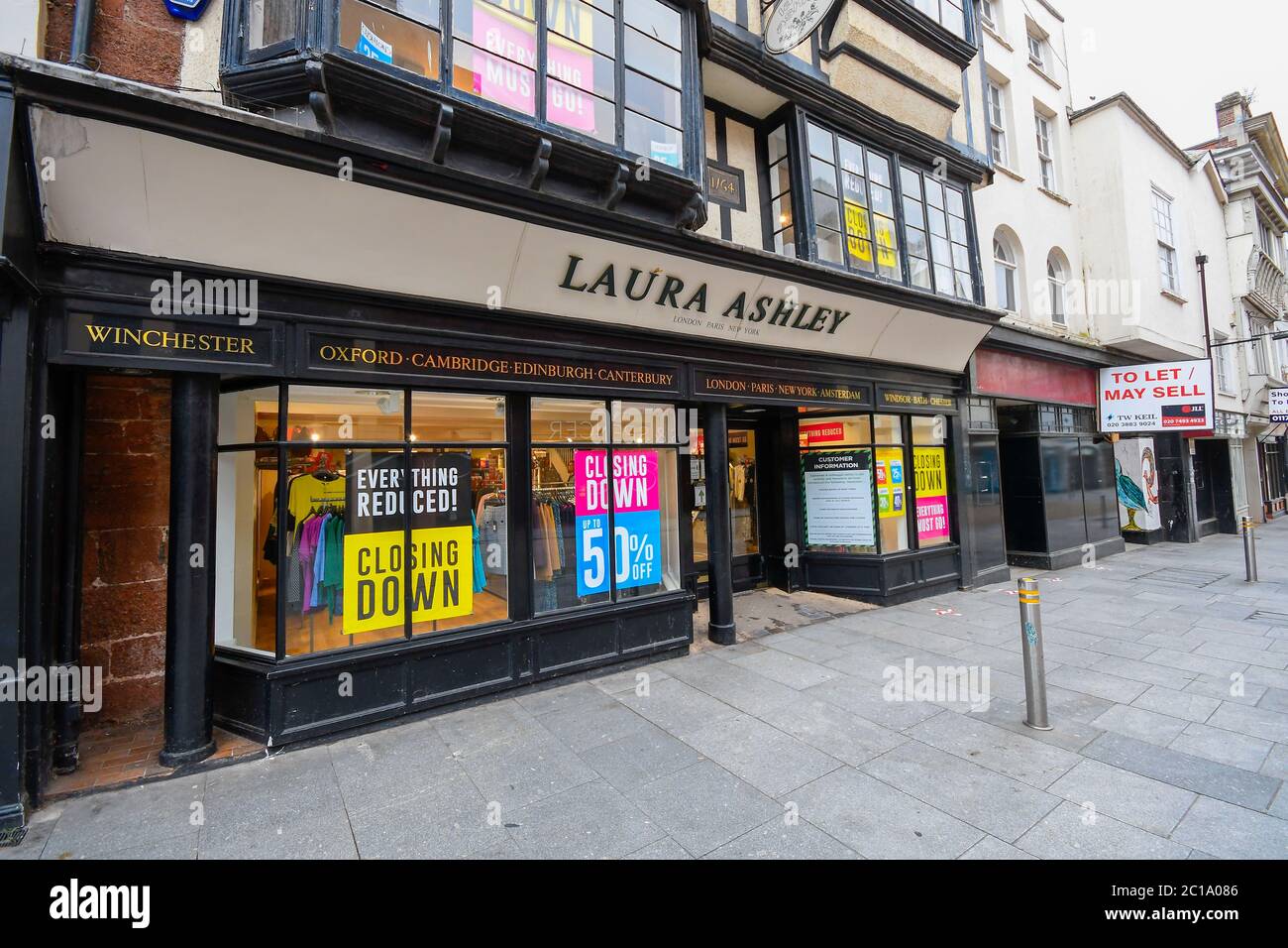 Exeter, Devon, UK.  15th June 2020.   Shops selling unessential items allowed to reopen today as coronavirus lockdown is eased further.  The Laura Ashley store in the High Street at Exeter in Devon reopening with a closing down sale. Picture Credit: Graham Hunt/Alamy Live News Stock Photo