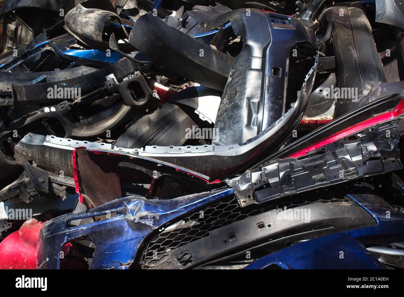 Closeup view on broken plastic and metal cars parts automobile