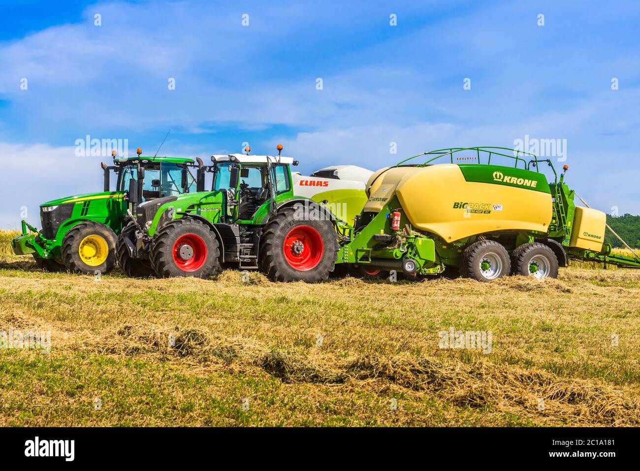 Krone 1290 Big Pack High Speed Square Baler behind Fendt 939 tractor - France.. Stock Photo