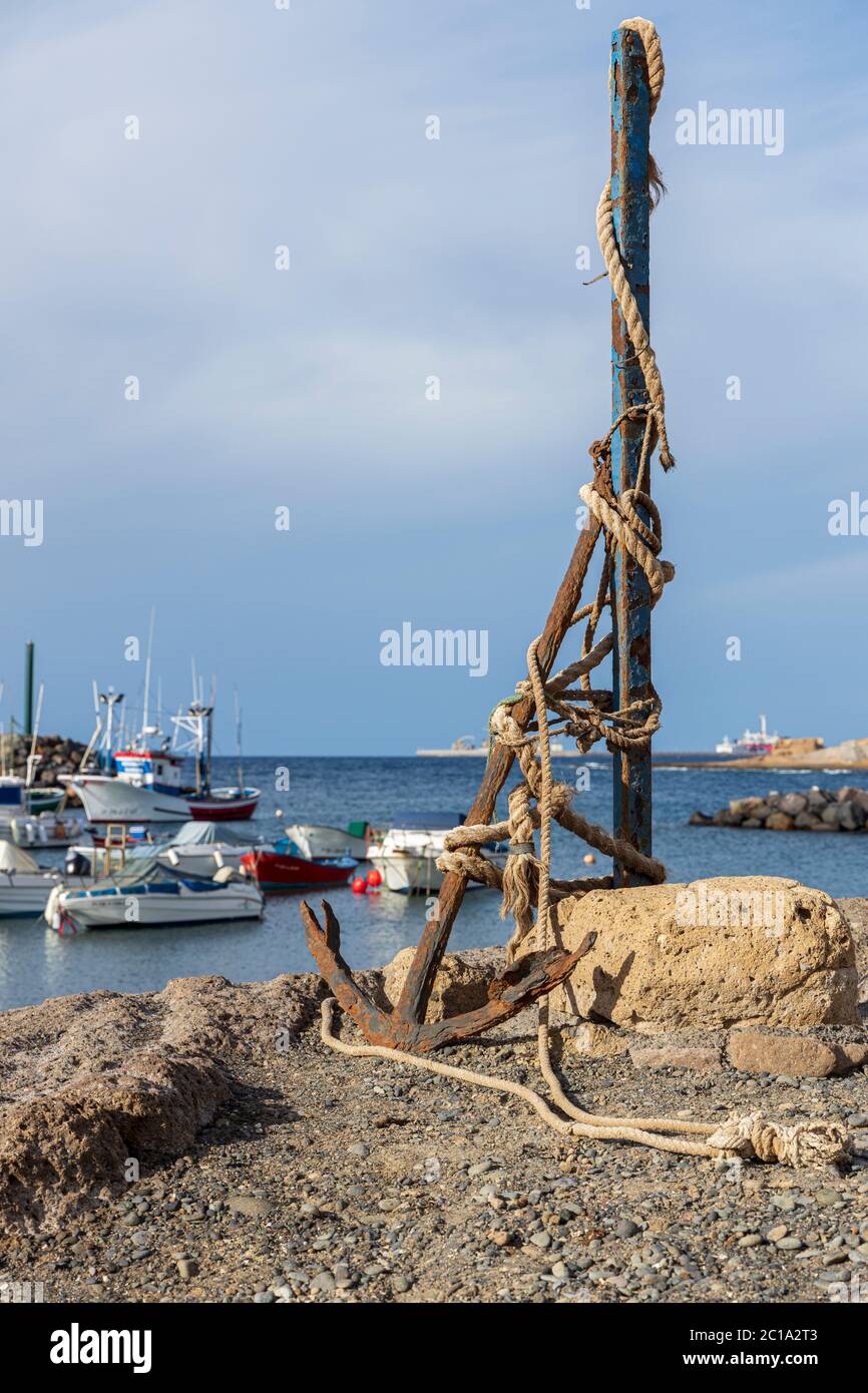 Rusting anchor at the fishing harbour in Tajao, Tenerife, Canary Islands, Spain Stock Photo