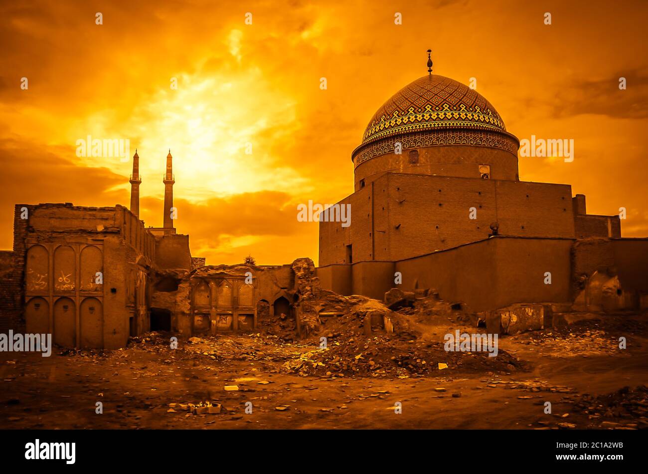 Sunset over the damaged mosque in Kashan in Iran Stock Photo - Alamy