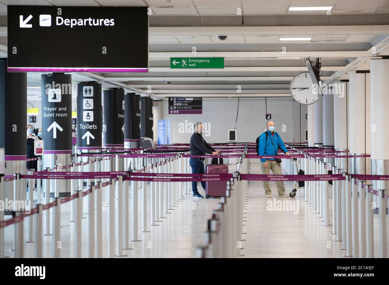 Wait check in area edinburgh airport hi-res stock photography and ...