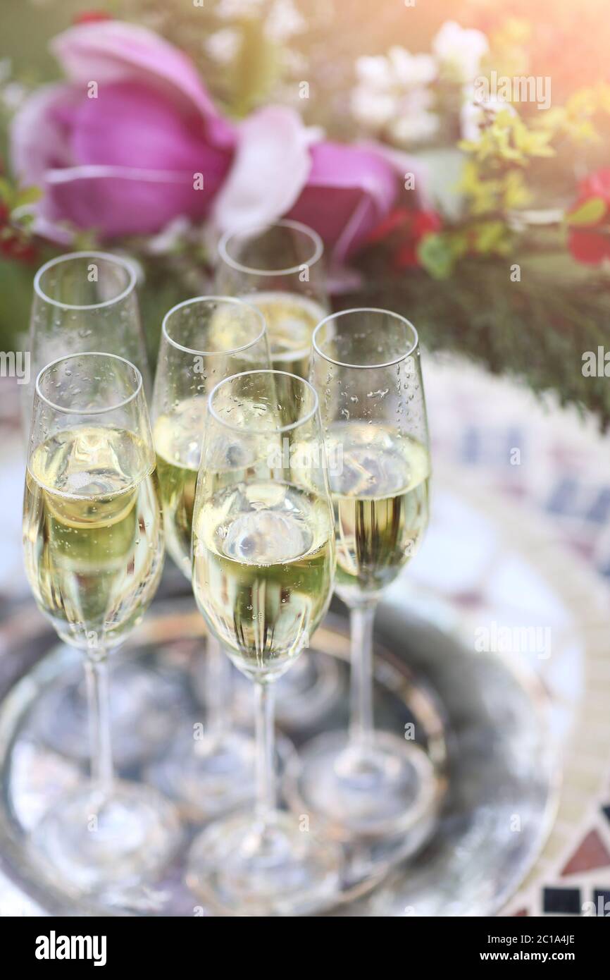 Champagne glasses on silver tray Stock Photo Alamy
