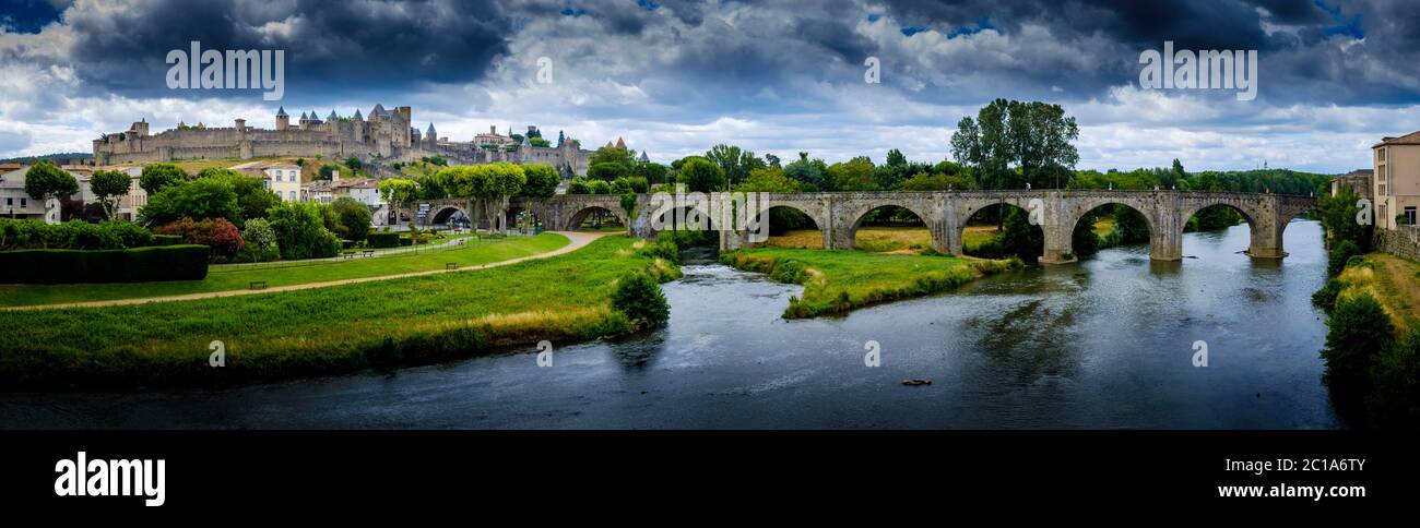 Distant view of Carcassonne Castle and Pont Vieux crossing the Aude at Carcassonne Aude France Stock Photo