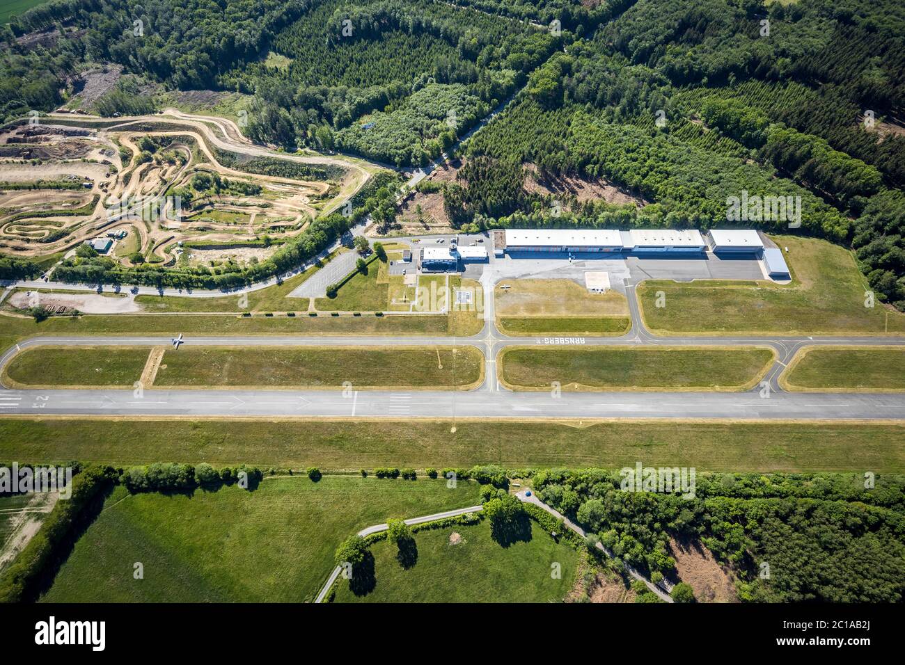 Aerial photograph, Arnsberg Menden airfield, EDLA, commercial airfield, motocross track MCC Vosswinkel, Arnsberg, Sauerland, Hochsauerlandkreis, North Stock Photo